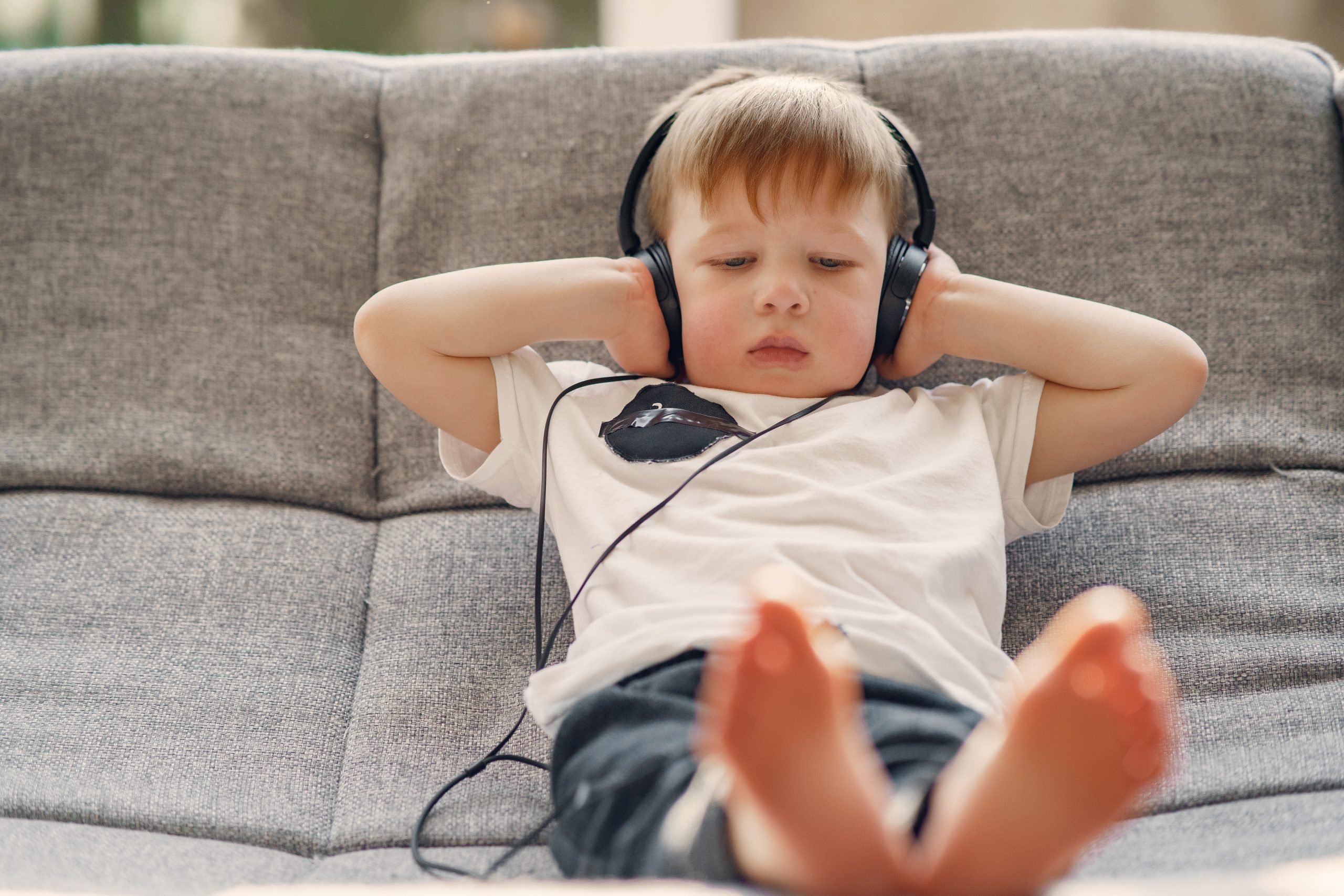 Little Boy Listening To Music On Head Phone, Help Your Children Appreciate Music In The Homeschool