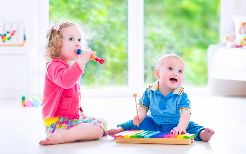 Toddler's Playing With Musical Instruments, You Can Introduce Them To Music Appreciation In The Homeschool