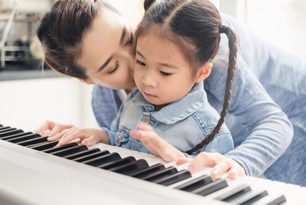 Mom Teaching Daughter To Play Piano, Playing The Piano Develops Important Life Skills